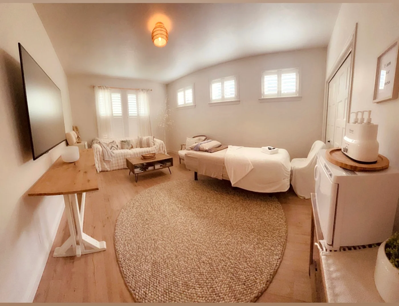 A quiet corner of the treatment room with soft seating